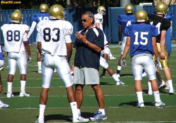 Think Chow works only with the QB’s?  Think again.  Here he is going one-on-one with WR Nelson Rosario.