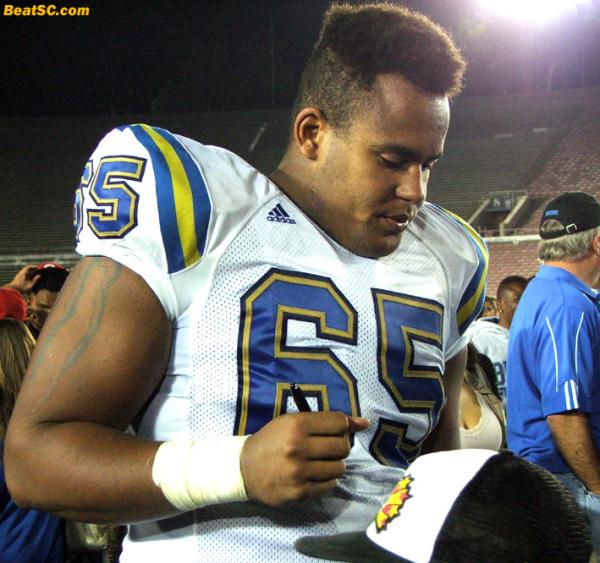 #65 - Mike Harris, Offensive Tackle.